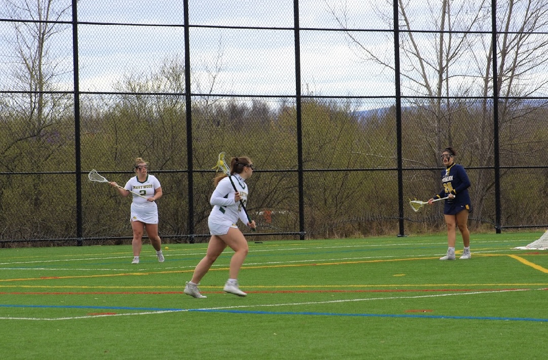 girl playing lacrosse