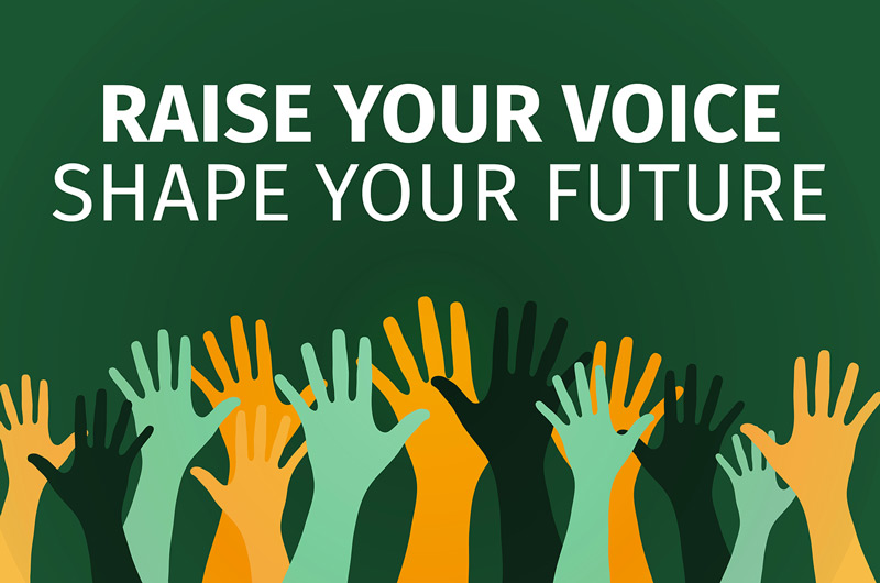 Multi-colored hands reaching in the air against a dark green background with the words Raise Your Voice Shape Your Future in white.