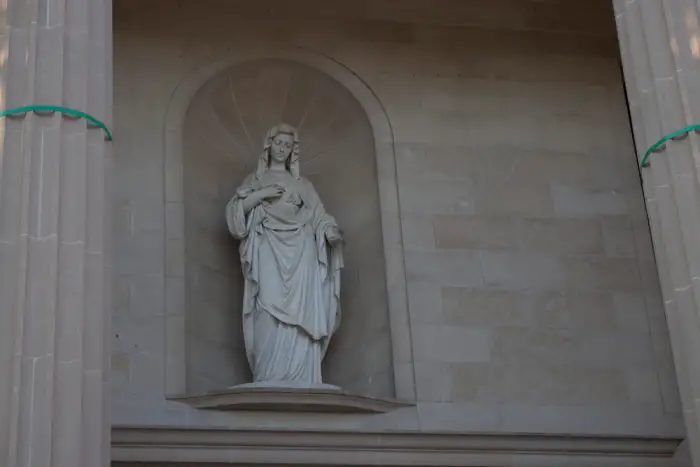 a statute of the named the immaculate heart of Mary