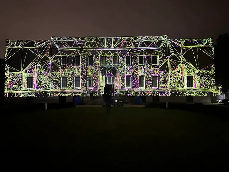 Icon of an art palette and paintbrush with a Marywood M logo in green against a gold background.